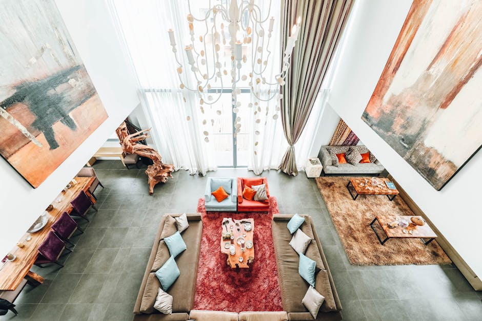 Aerial view of a luxurious modern living room with elegant furniture and artwork