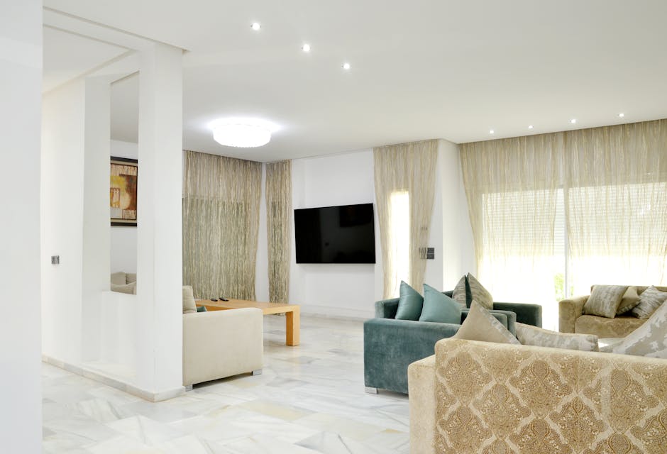 Spacious modern living room with elegant sofas and stylish decor